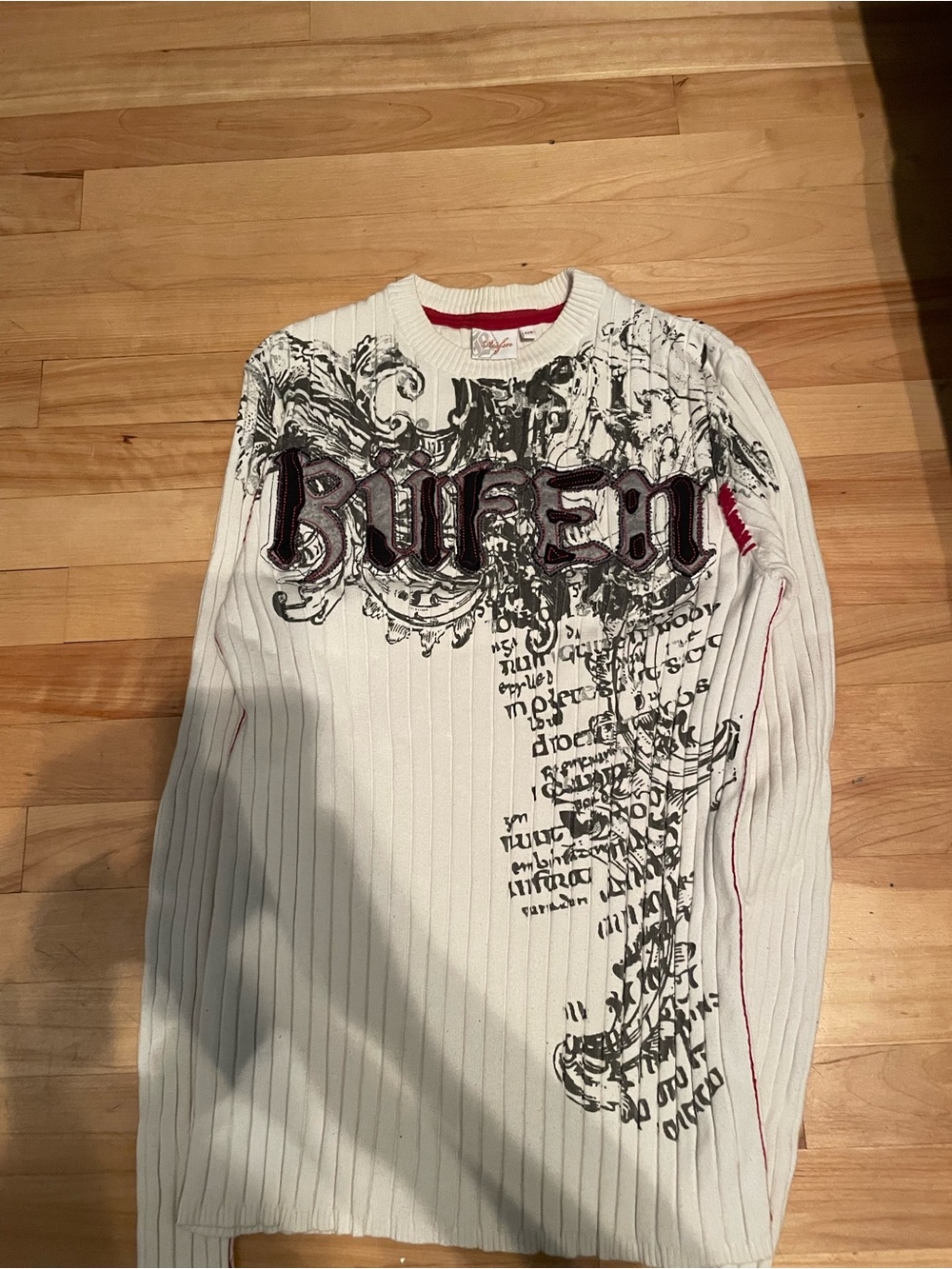 Rüfen sweater with ornate lettering and designs